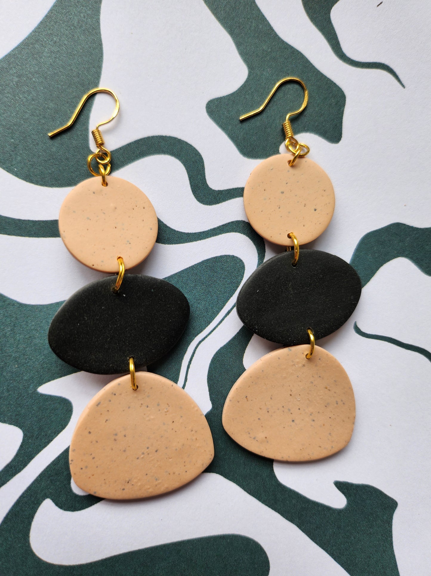 Black and tan dangles