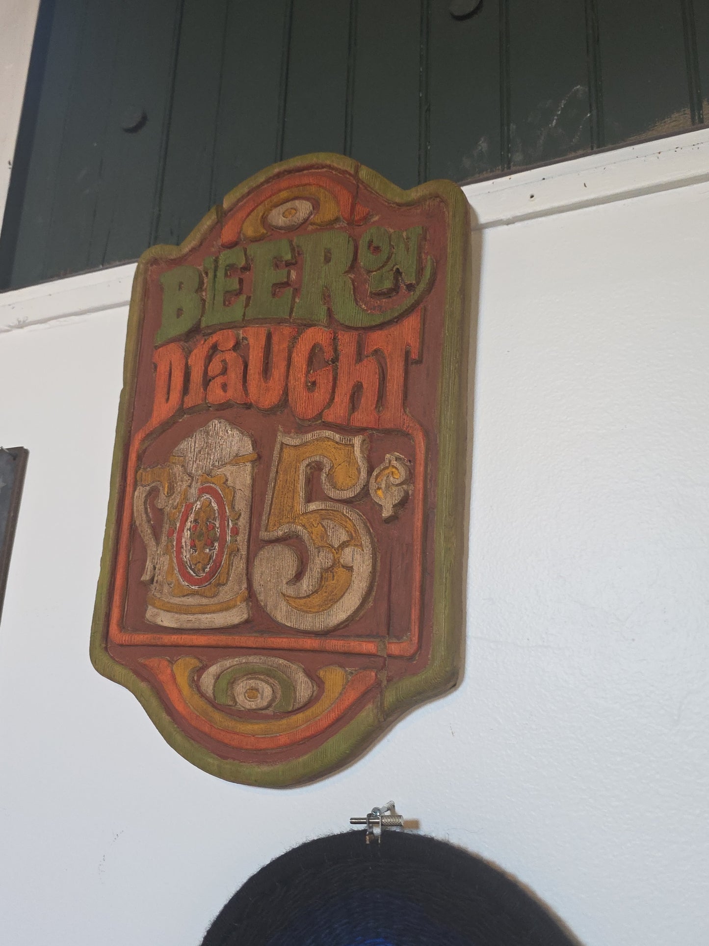 Faux wood 70s Draught Beer sign
